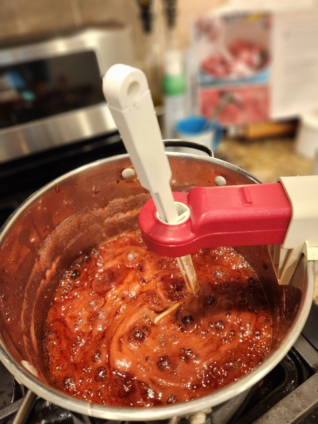 Strawberry jam bubbling away